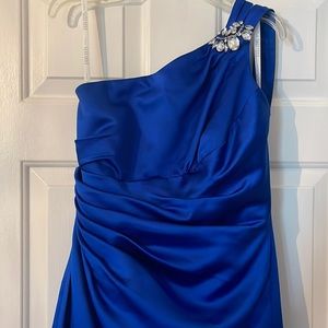 Blue embellished one shoulder bridesmaid dress.